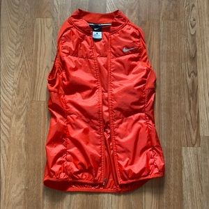 Vest -reddish orange. Very light vest